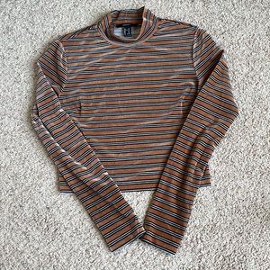 Medium orange with black and white stripes cropped sweater by Forever 21.